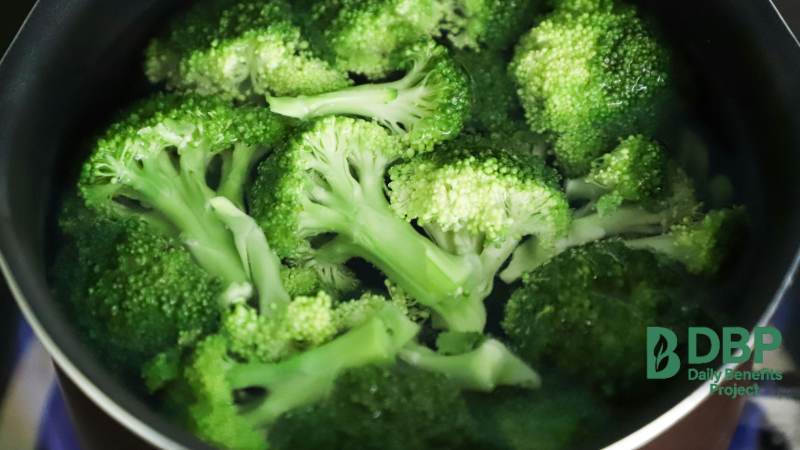 Boiling Broccoli for Cooking Bright green broccoli florets being boiled in water
