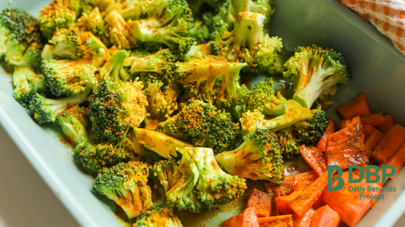 Roasted Broccoli and Carrots Seasoned broccoli and carrots in a pan ready for roasting