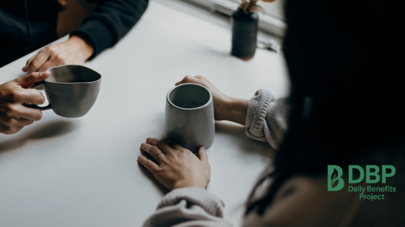 Talking Over Coffee – Building Support for a Diabetes Meal Plan Two people sitting at a table having a conversation over coffee mugs