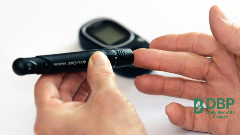 Monitoring Blood Sugar for Your Diabetes Meal Plan A person checking blood sugar level with a glucometer for diabetes management