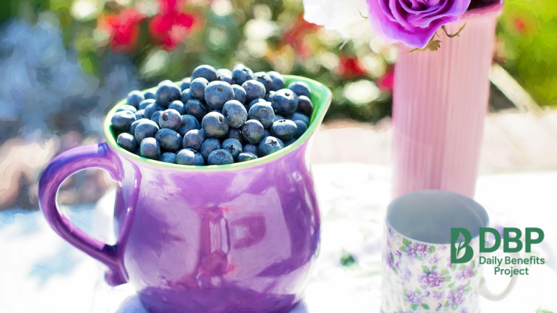 Fresh Blueberries in a Purple Jug A purple jug filled with fresh blueberries on an outdoor table