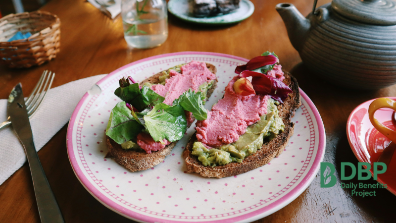 Vegan Avocado Toast Plate Vegan toast with avocado spread and beetroot hummus