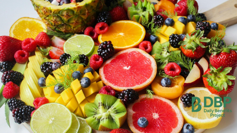 Fresh citrus fruits including oranges, lemons, and grapefruits Assorted citrus fruits on table to boost vitamin C intake