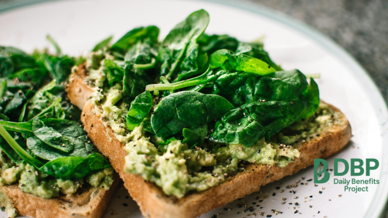 Whole grain toast topped with fresh spinach and avocado Spinach and avocado toast as a nutritious immune-supporting meal