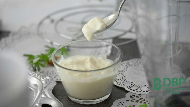 Yoghurt with live cultures Bowl of Greek yoghurt with spoon